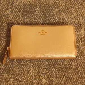 Coach gold pebbled leather accordion wallet